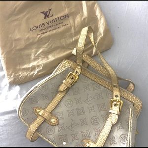 Cream snake patterned Louis Vuitton bag